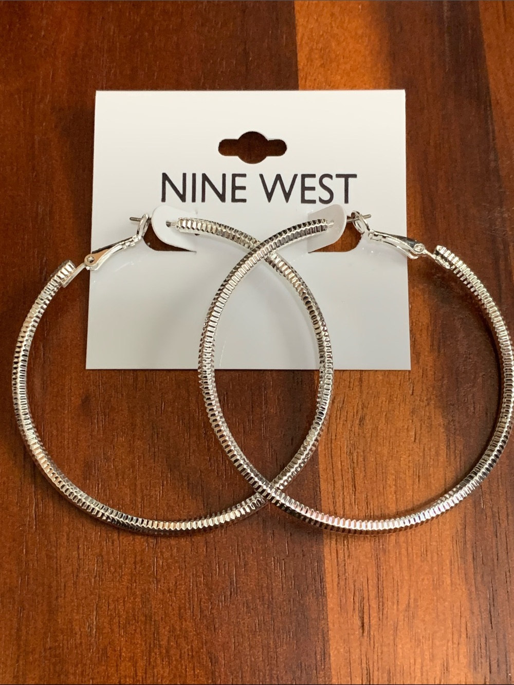 NWT Nine West silver tone textured hoop earrings